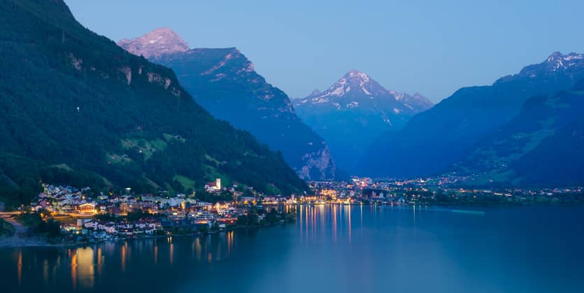 Night landscape. Chalets and traditional houses in Switzerland. Mountain village in Central Europe. Canton Uri. Altdorf.